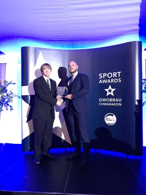 Sport Caerphilly Sport Awards 2018 - Head Coach Jonathan Morgan wins Community Coach of the Year Award, presented by Richard Rees